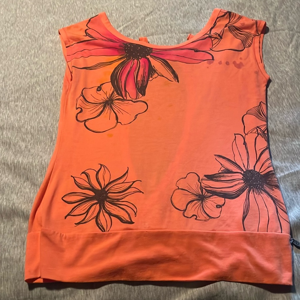 Roxy floral cotton blouse with a tie back.